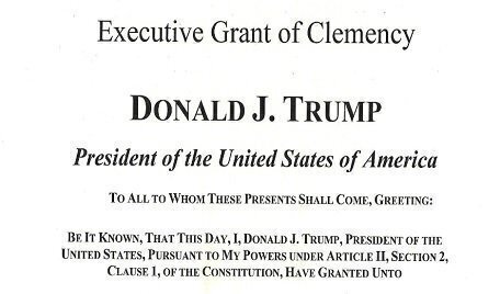 How does the president grant pardons under the Constitution?